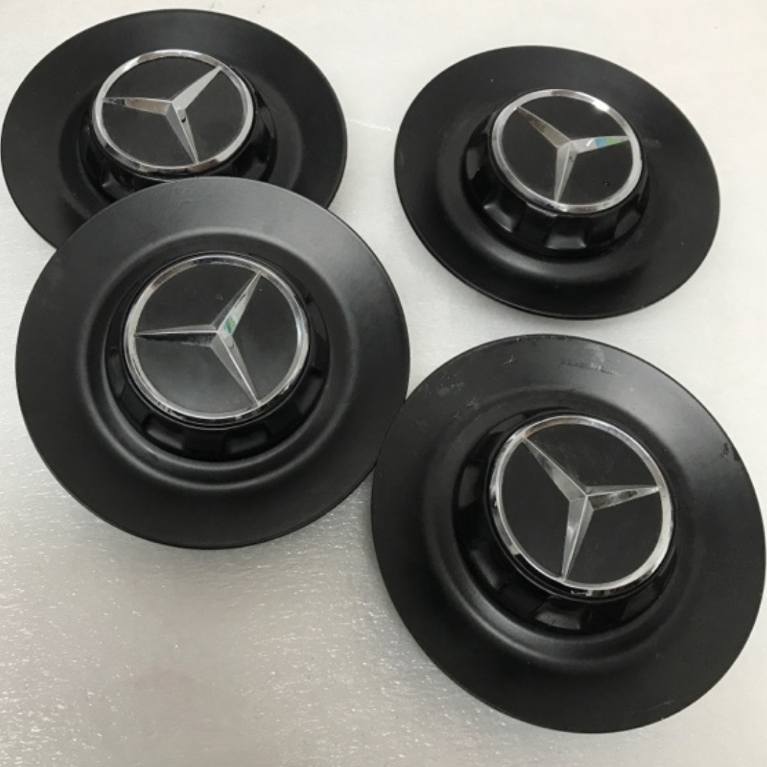 Set of 4 Mercedes Benz Wheel Center Caps A0004001100 2911b003