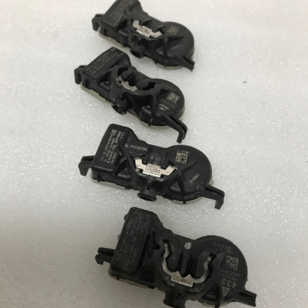 Set of 4 Cadillac TPMS Sensor 315 Mhz 22959744 a04c334c